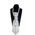 Cravatta Gioiello Blue and Gold Cross su manichino visione frontale